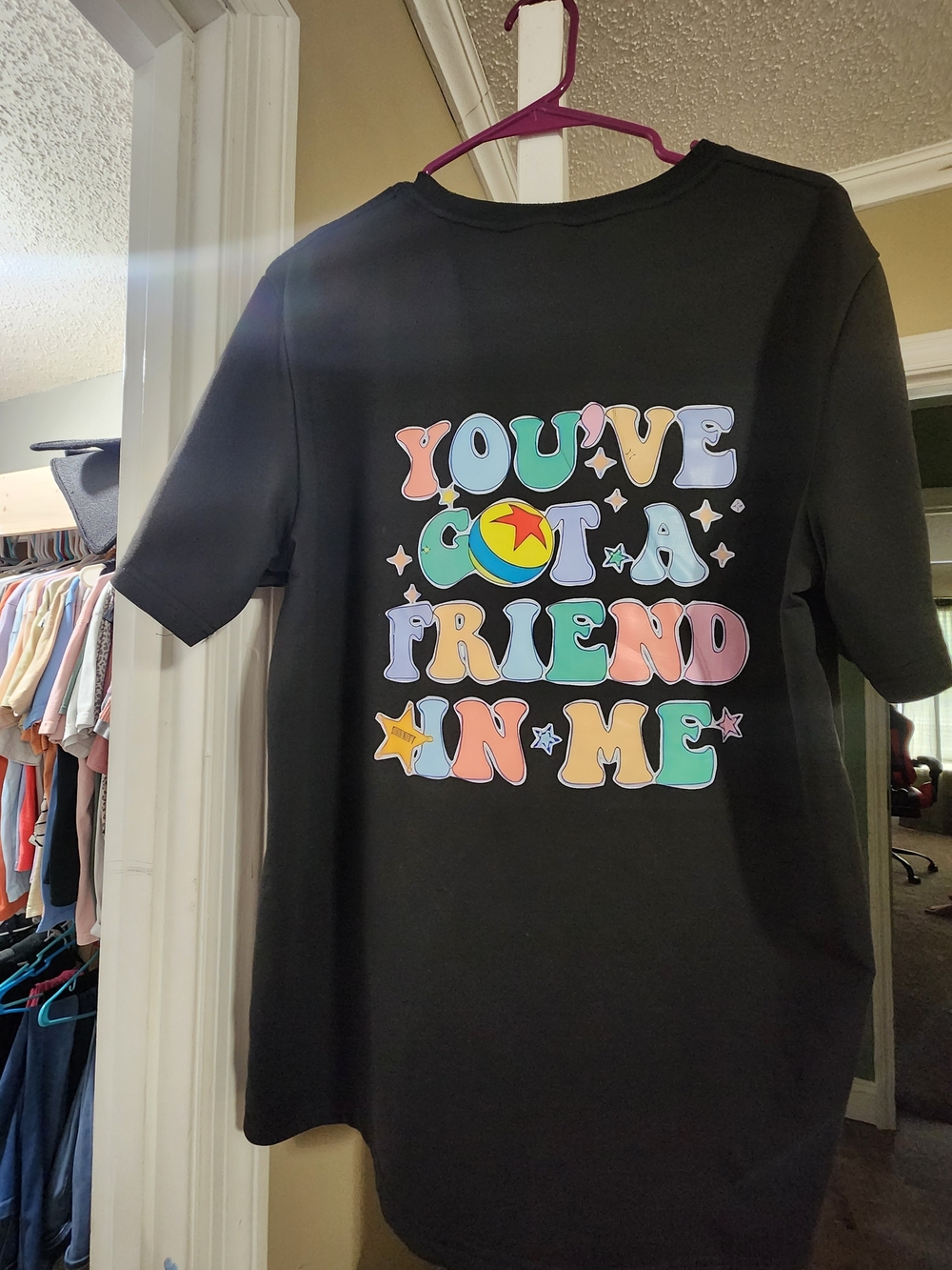 Black Graphic Short Sleeve Tee - Colorful "You've Got A Friend In Me" Toy Story